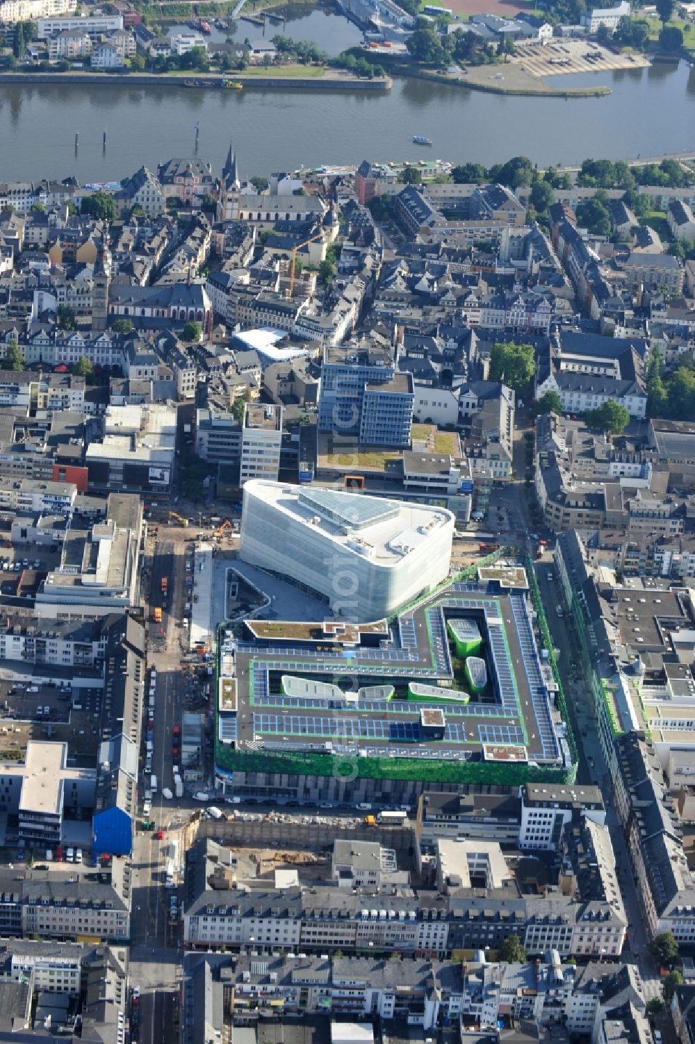 Aerial photograph Koblenz - View of the new shopping center and cultural building Forum Middle Rhine in the central square in Koblenz. The shopping center, which is scheduled to open in September 2012, was designed by the architectural firm Benthem Crouwel, is being built by the Züblin AG and operated by the ECE Project Management. The cultural building, scheduled to open in 2013, is going to be a new home for the Middle Rhine Museum and the city library of Koblenz