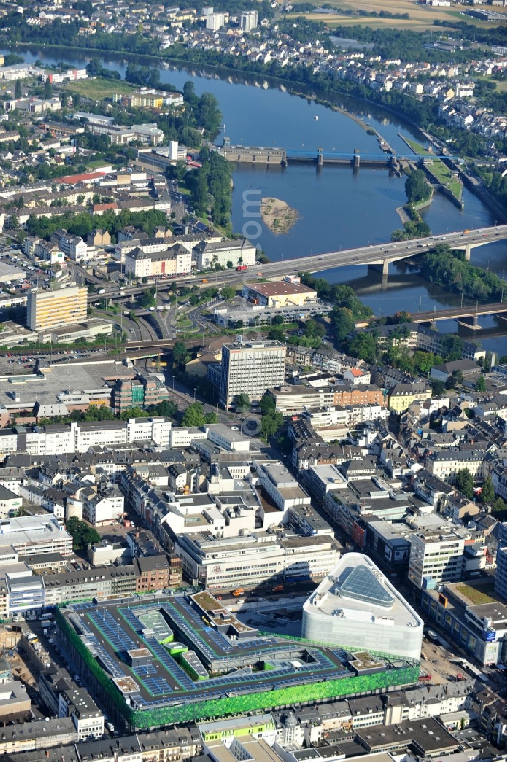 Koblenz from above - View of the new shopping center and cultural building Forum Middle Rhine in the central square in Koblenz. The shopping center, which is scheduled to open in September 2012, was designed by the architectural firm Benthem Crouwel, is being built by the Züblin AG and operated by the ECE Project Management. The cultural building, scheduled to open in 2013, is going to be a new home for the Middle Rhine Museum and the city library of Koblenz