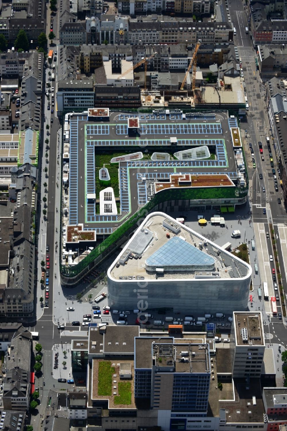 Koblenz from above - View of the new shopping center and cultural building Forum Middle Rhine in the central square in Koblenz. The shopping center, which is scheduled to open in September 2012, was designed by the architectural firm Benthem Crouwel, is being built by the Züblin AG and operated by the ECE Project Management. The cultural building, scheduled to open in 2013, is going to be a new home for the Middle Rhine Museum and the city library of Koblenz