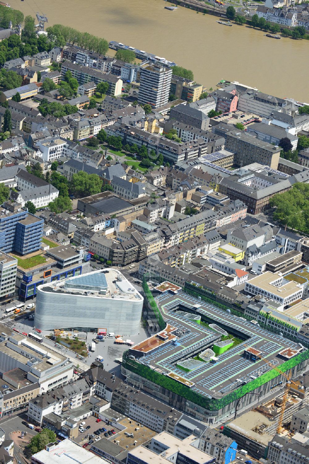 Aerial photograph Koblenz - View of the new shopping center and cultural building Forum Middle Rhine in the central square in Koblenz. The shopping center, which is scheduled to open in September 2012, was designed by the architectural firm Benthem Crouwel, is being built by the Züblin AG and operated by the ECE Project Management. The cultural building, scheduled to open in 2013, is going to be a new home for the Middle Rhine Museum and the city library of Koblenz