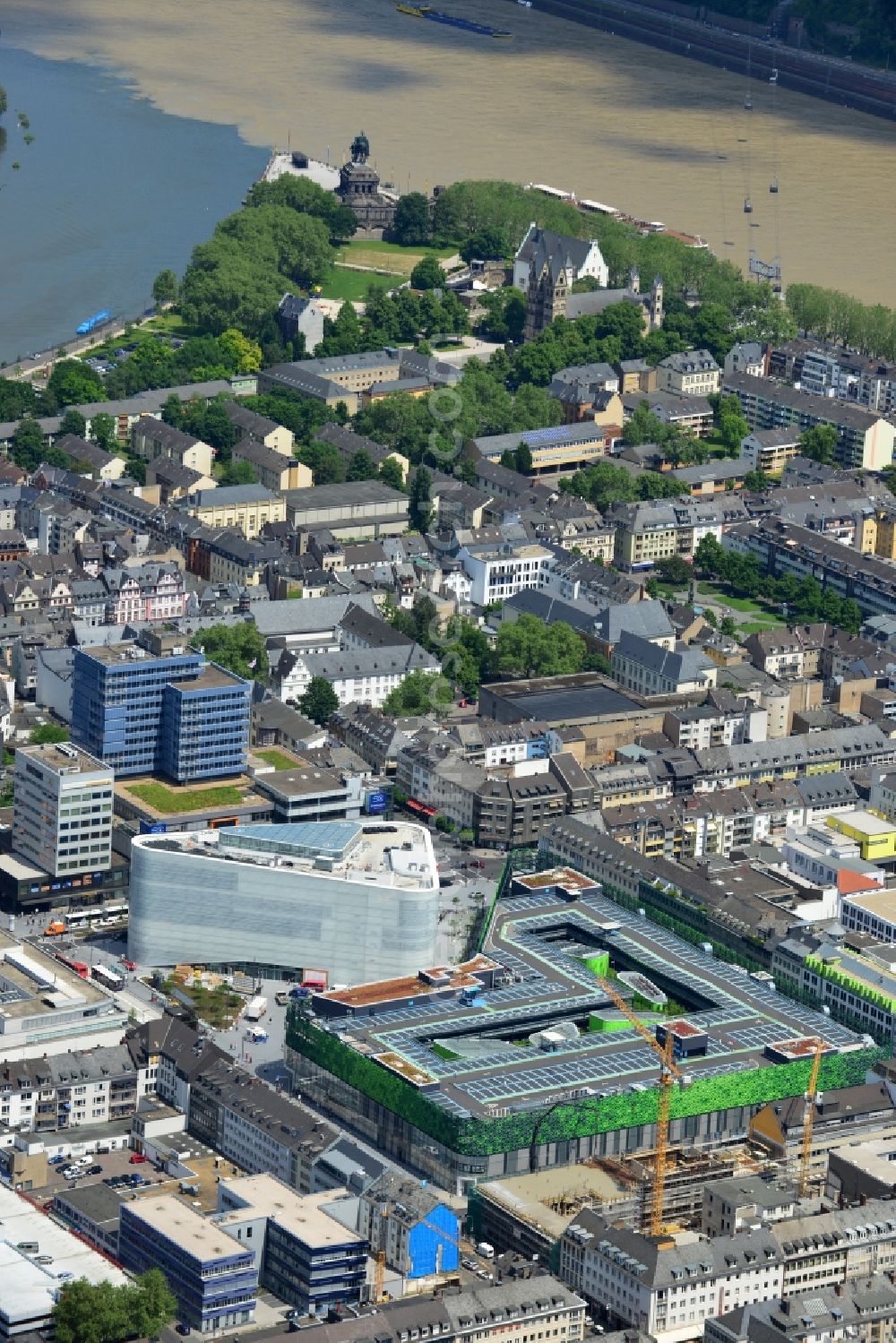 Koblenz from above - View of the new shopping center and cultural building Forum Middle Rhine in the central square in Koblenz. The shopping center, which is scheduled to open in September 2012, was designed by the architectural firm Benthem Crouwel, is being built by the Züblin AG and operated by the ECE Project Management. The cultural building, scheduled to open in 2013, is going to be a new home for the Middle Rhine Museum and the city library of Koblenz