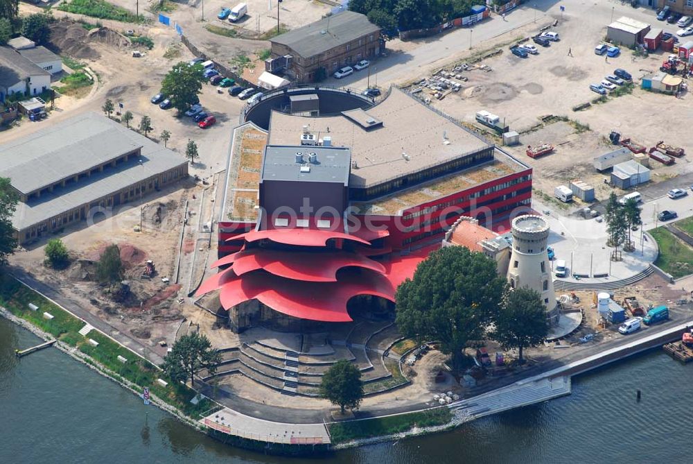 Aerial photograph Potsdam - 11.07.2006 Blick auf den Neubau des Hans Otto Theaters in Potsdam, entworfen wurde es vom Kölner Architekten Gottfried Böhm. Bauherr ist der KIS Potsdam. Es befindet sich auf dem Kultur- und Gewerbestandort Schiffsbauergasse am Ufer des Tiefen Sees. In den Neubau integriert sind ein alter Gasometer sowie der Turm einer früheren Zichorienmühle. (Besucherservice und Kartenverkauf: ticket-service@hot.potsdam.de, Tel. 0331- 98 11 8 / URL: