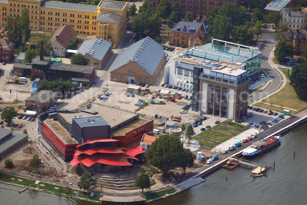 Potsdam from the bird's eye view: 11.07.2006 Blick auf den Neubau des Hans Otto Theaters in Potsdam, entworfen wurde es vom Kölner Architekten Gottfried Böhm. Bauherr ist der KIS Potsdam. Es befindet sich auf dem Kultur- und Gewerbestandort Schiffsbauergasse am Ufer des Tiefen Sees. In den Neubau integriert sind ein alter Gasometer sowie der Turm einer früheren Zichorienmühle. (Besucherservice und Kartenverkauf: ticket-service@hot.potsdam.de, Tel. 0331- 98 11 8 / URL: