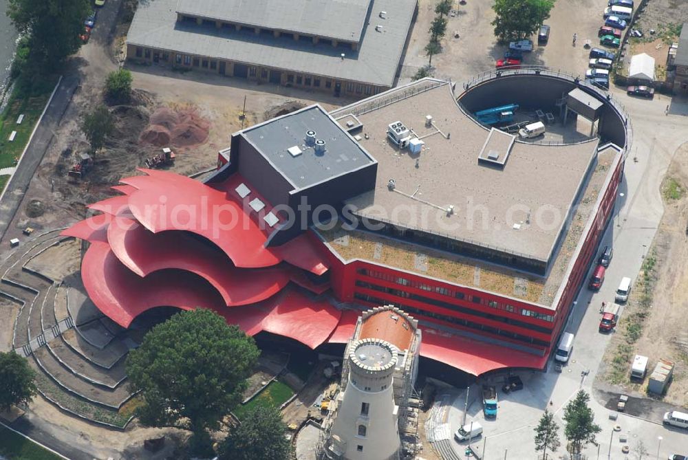 Aerial image Potsdam - 11.07.2006 Blick auf den Neubau des Hans Otto Theaters in Potsdam, entworfen wurde es vom Kölner Architekten Gottfried Böhm. Bauherr ist der KIS Potsdam. Es befindet sich auf dem Kultur- und Gewerbestandort Schiffsbauergasse am Ufer des Tiefen Sees. In den Neubau integriert sind ein alter Gasometer sowie der Turm einer früheren Zichorienmühle. (Besucherservice und Kartenverkauf: ticket-service@hot.potsdam.de, Tel. 0331- 98 11 8 / URL: