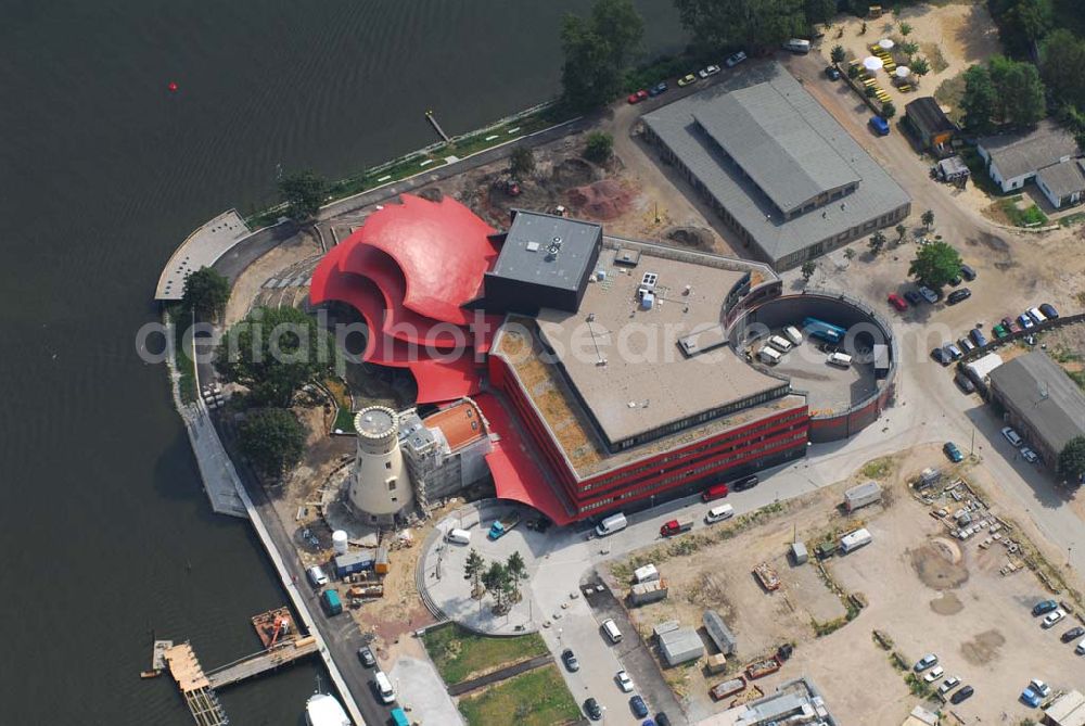 Aerial photograph Potsdam - 11.07.2006 Blick auf den Neubau des Hans Otto Theaters in Potsdam, entworfen wurde es vom Kölner Architekten Gottfried Böhm. Bauherr ist der KIS Potsdam. Es befindet sich auf dem Kultur- und Gewerbestandort Schiffsbauergasse am Ufer des Tiefen Sees. In den Neubau integriert sind ein alter Gasometer sowie der Turm einer früheren Zichorienmühle. (Besucherservice und Kartenverkauf: ticket-service@hot.potsdam.de, Tel. 0331- 98 11 8 / URL: