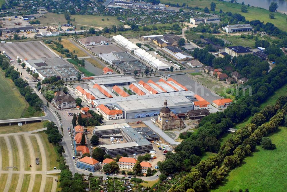 Dresden from the bird's eye view: Blick auf das neue Dresdner Messegelände im Ostragehege. 2001 ist die neue Messe hierher umgezogen. Durch die Architekten Walter Kaplan, Christian Matzke und Klausjürgen Schöler (KMSP) wurde der Alte Schlachthof von Erlwein saniert und umgebaut. Kontaktb Alter Schlachthof: Bernd Aust Kulturmanagement GmbH, Gothaer Straße 11, D-01097 Dresden, Telefon: +49 351 43131-0, Telefax: +49 351 43131-17, E-Mail: info@aust-konzerte.com, Web: