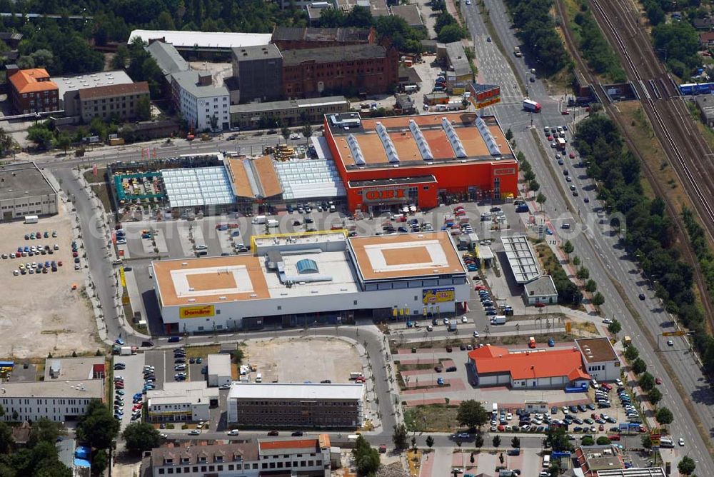 Aerial photograph Berlin - Adlershof,11.07.2006,Blick auf eine Obi Filiale in Berlin Adlershof,Zentral am Adlergestell gelegen,Guter Verkehrsanschluss vorhanden,Adresse: OBI Baumarkt,Berlin-Adlershof,Adlergestell 303 / Glienicker Weg D 12489 Berlin-Adlershof,Kontakt: Tel.:030 / 670660,Fax: 030 / 67066120