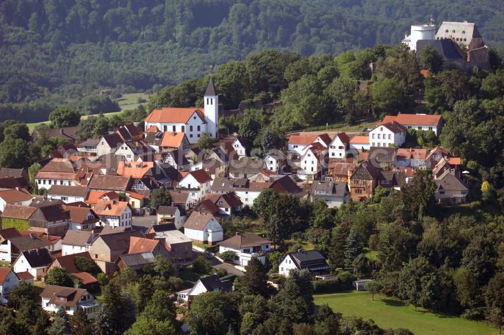 Otzberg from the bird's eye view: Blick auf den Ortsteil Hering der Gemeinde Otzberg. Der Ort hat 1000 Einwohner und liegt auf 300 Metern Höhe am Otzberg. Im Hintergrund des Bildes steht die gleichnamige Veste Otzburg. Die Geschichte Herings ist eng mit der Festung auf dem Berg verbunden. Kontakt: Gemeinde Otzberg, Otzbergstraße 13, 64853 Otzberg, Tel. +49 (0)6162 9604 0, Fax +49 (0)6162 9604 22, Email gemeindeverwaltung@otzberg.de