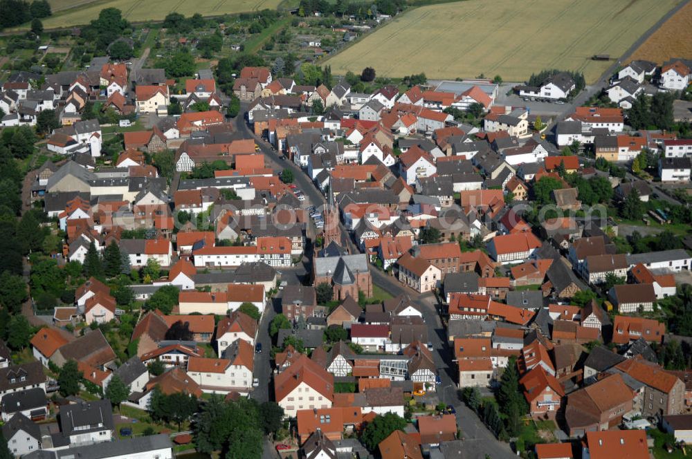 Babenhausen from the bird's eye view: Ortsansicht Langstadt mit nogotischer evangelischer Kirche. Sie wurde von 1878 bis 1880 erbaut. Langstadt hat 1660 Einwohner. Kontakt: Stadt Babenhausen, Marktplatz 2, 64832 Babenhausen, Tel. +49(0)6073 602 0, Fax +49(0)6073 602 22, internet@babenhausen.de