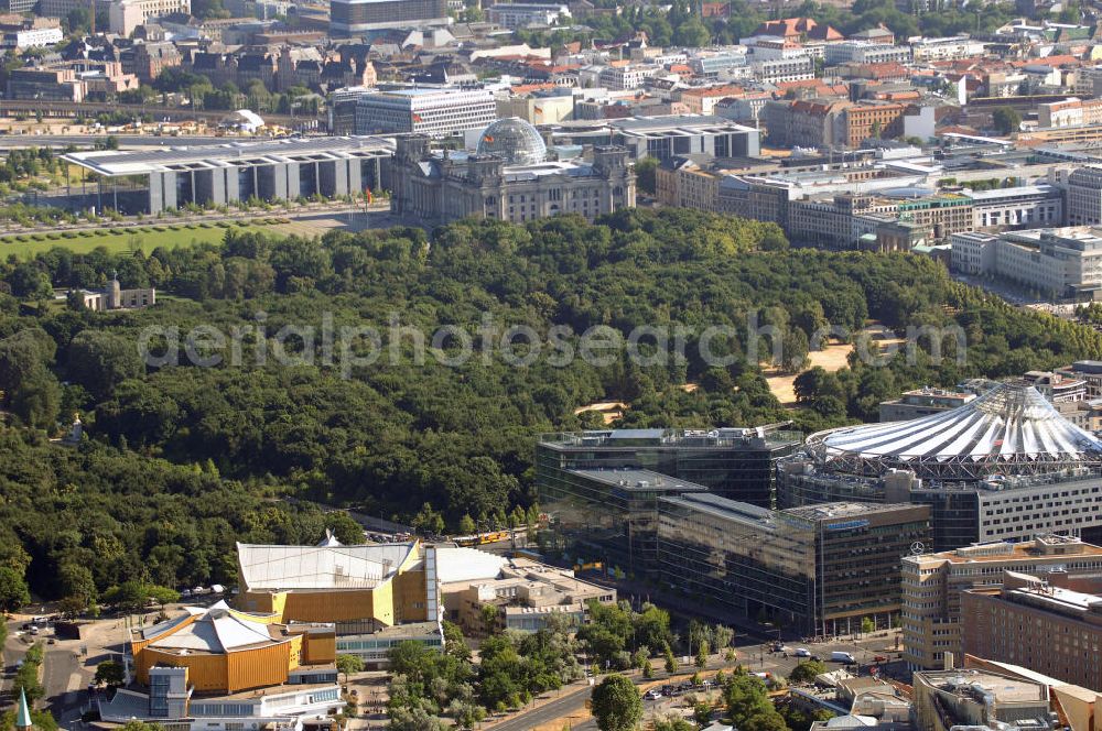 Berlin Mitte from the bird's eye view: Die Berliner Philharmonie am Kemperplatz in Tiergarten ist einer der wichtigsten Konzertsäle in Berlin und die Heimstätte der Berliner Philharmoniker. Neben dem Sonycenter am Potsdamer Platz, im Hintergrund der Reichstag / Bundestag. Anschrift: Berliner Philharmonie, Herbert-von-Karajan-Str.1, 10785 Berlin; Tel.: 030 254 88-0