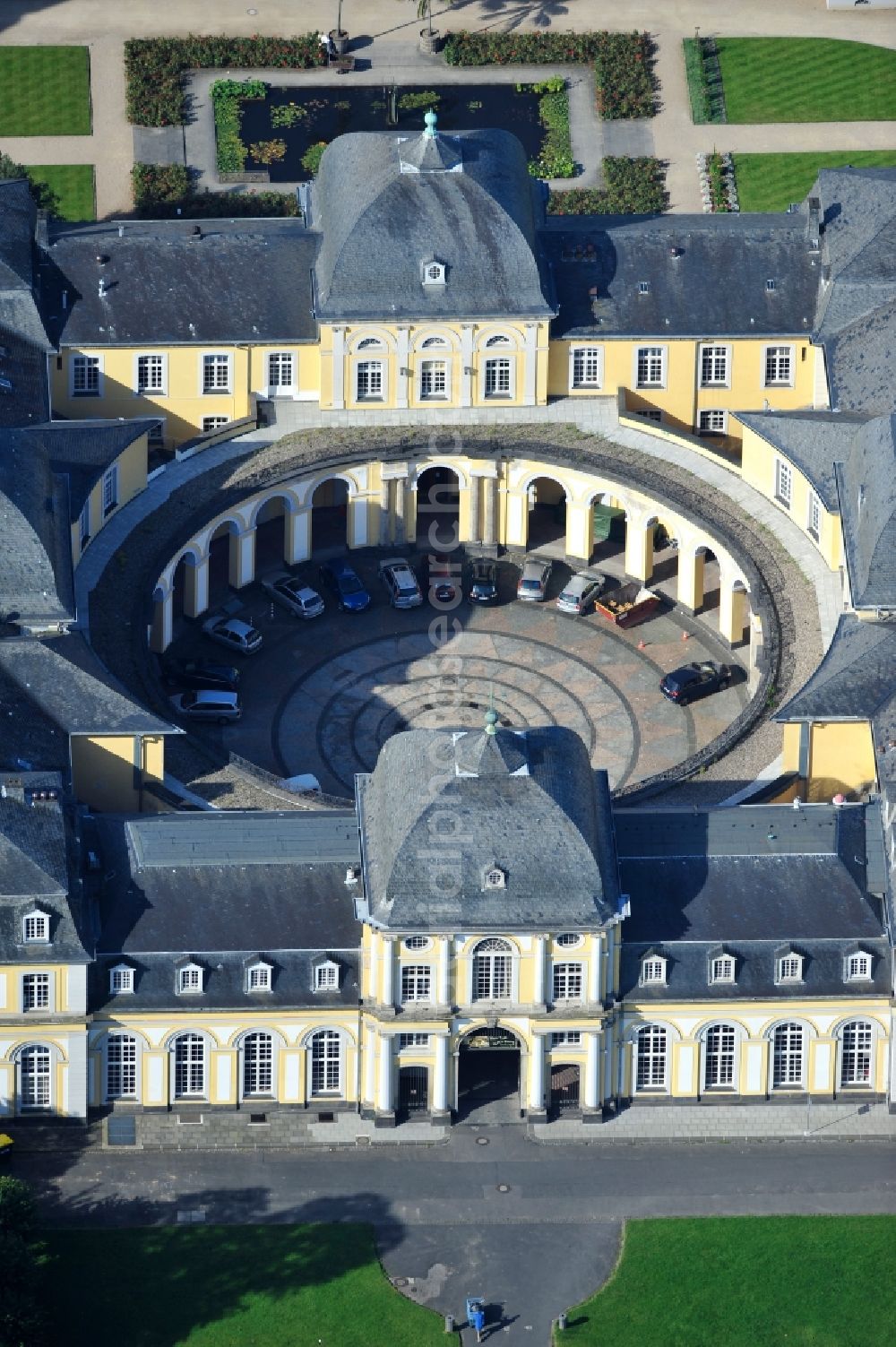 Bonn from above - View of the Poppelsdorfer castle in Bonn in the state of North Rhine-Westphalia. The Poppelsdorfer Baroque palace was designed by the architect Frenchman Robert de Cotte and built from 1715 to 1740. Currently, the castle contains scientific institutions with a courtyard, where castleconcerts are held