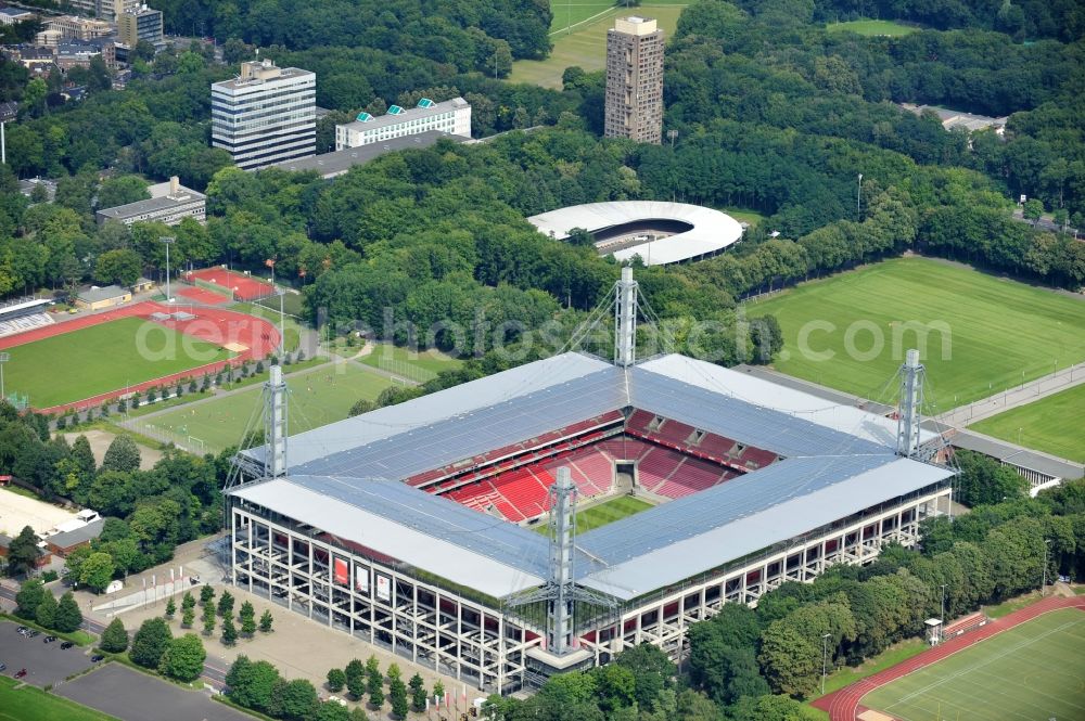 Köln from the bird's eye view: The RheinEnergieStadion is a football stadium in the district Mungersdorf of Cologne. It is the home ground of the football club 1. FC Koeln. Its predecessor was the Mungerdorferstadion, which was built at the same place. Through a sponsorship deal, the stadium now has the name of the energy provider Rhein Energie Koeln