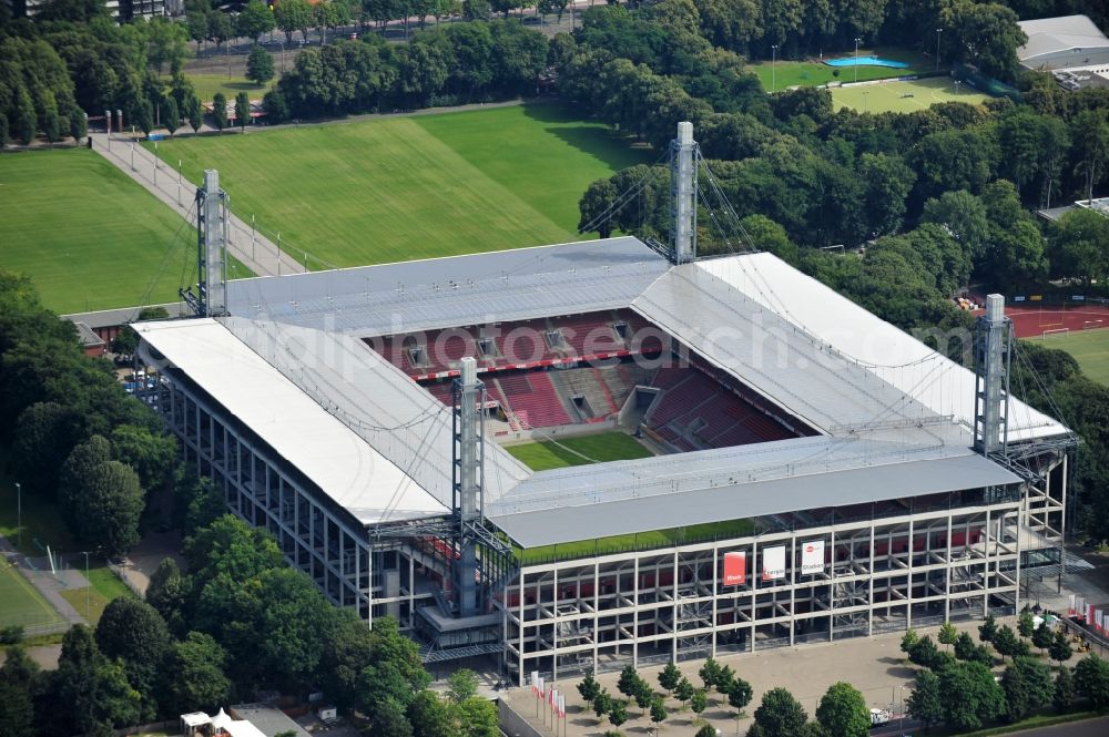 Köln from the bird's eye view: The RheinEnergieStadion is a football stadium in the district Mungersdorf of Cologne. It is the home ground of the football club 1. FC Koeln. Its predecessor was the Mungerdorferstadion, which was built at the same place. Through a sponsorship deal, the stadium now has the name of the energy provider Rhein Energie Koeln