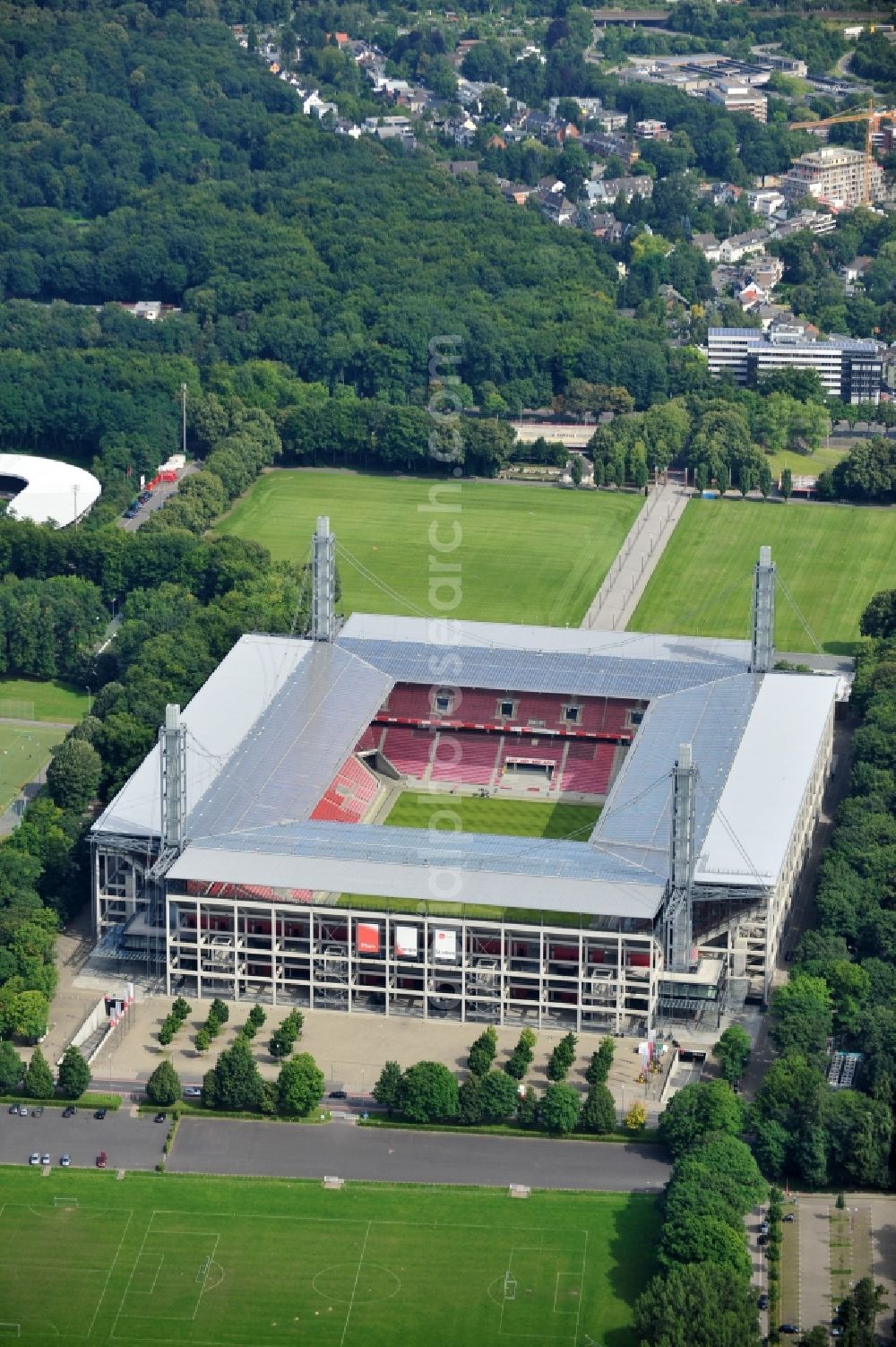 Köln from above - The RheinEnergieStadion is a football stadium in the district Mungersdorf of Cologne. It is the home ground of the football club 1. FC Koeln. Its predecessor was the Mungerdorferstadion, which was built at the same place. Through a sponsorship deal, the stadium now has the name of the energy provider Rhein Energie Koeln