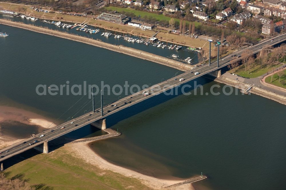 Düsseldorf from above - View of the Rhine with the Theodor Heuss Bridge in Düsseldorf in North Rhine-Westphalia NRW. The Theodor Heuss Bridge, which was built in 1957, forms the central area of ??the Düsseldorf bridge family