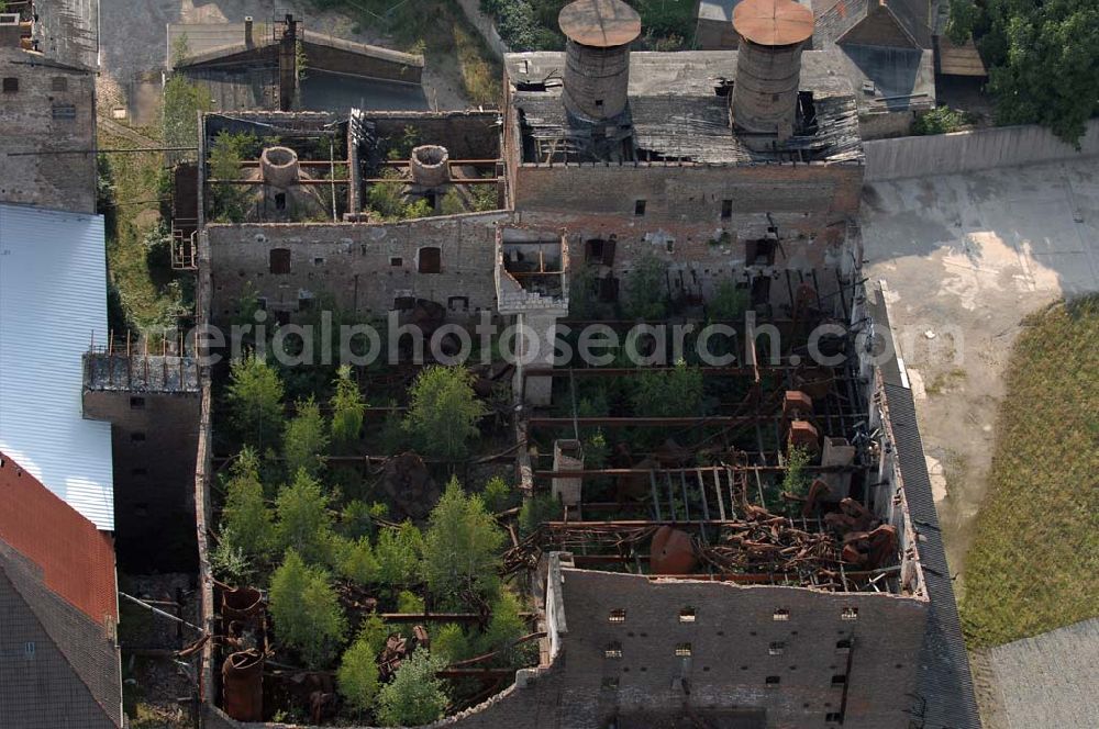 Aerial image Nienburg - Blick auf das Ruinengebäude der alten Malzfabrik nahe der Schloßstraße in Nienburg an der Saale.