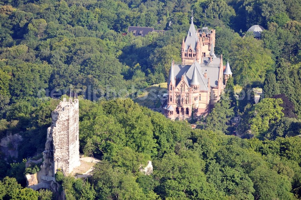 Königswinter from above - View of the Castle Drachenburg and of the ruins of Drachenfels in Königswinter in North Rhine-Westphalia. Castle Drachenburg is a castle-like estate on the Drachenfels, whose foundation stone was set in 1882 and completed in record time to 1884 in historistischem style. It is a historical monument since 1986 and is now used as a kind of museum