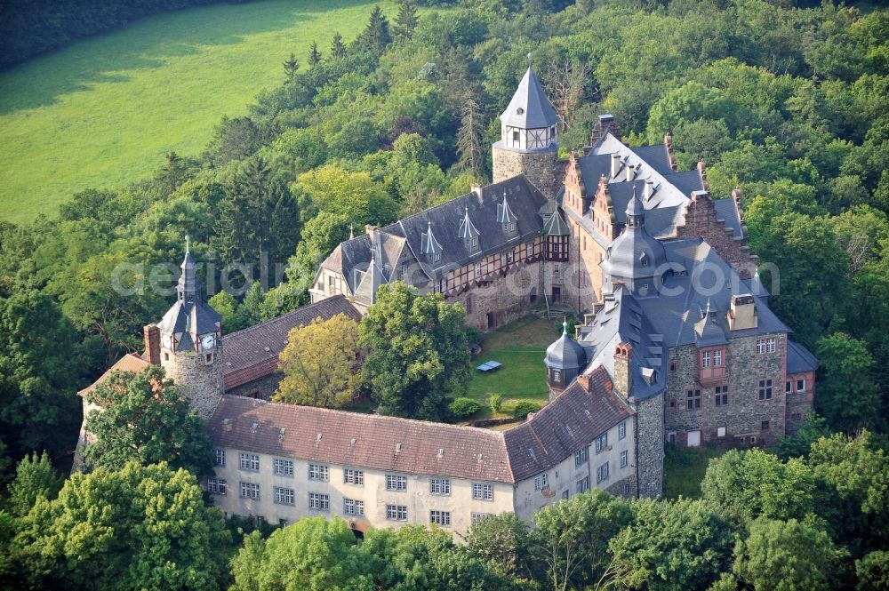 Mansfeld from above - View of the castle Rammelburg in the homonymous district of the town Mansfeld in Saxony-Anhalt. It was built in the 13th Century and was used as a children's home and rehabilitation clinic at the time of the GDR. Today the building is vacant and unused