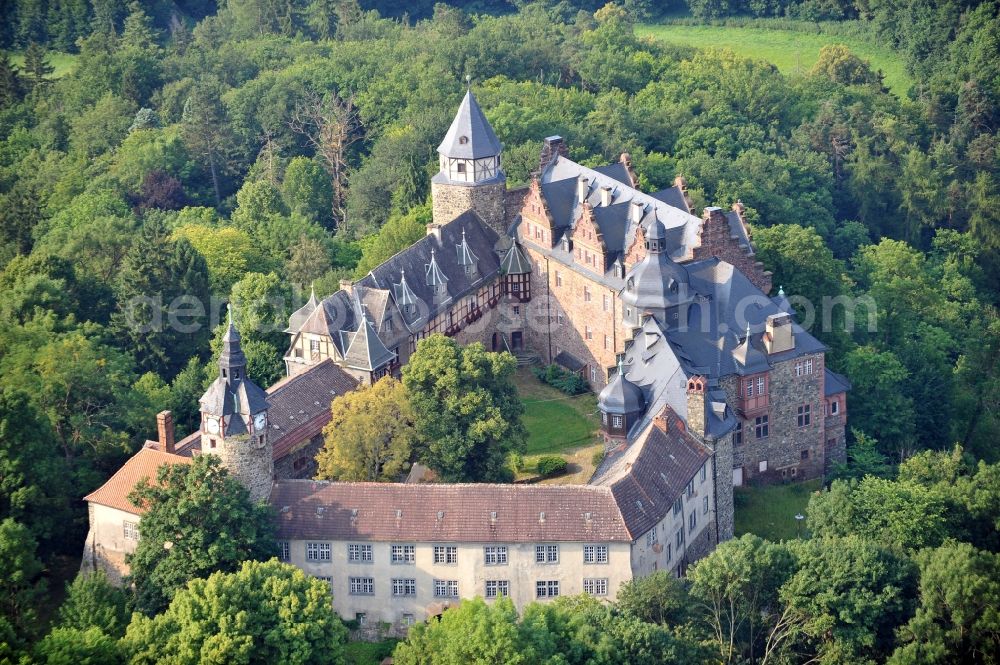 Mansfeld from the bird's eye view: View of the castle Rammelburg in the homonymous district of the town Mansfeld in Saxony-Anhalt. It was built in the 13th Century and was used as a children's home and rehabilitation clinic at the time of the GDR. Today the building is vacant and unused