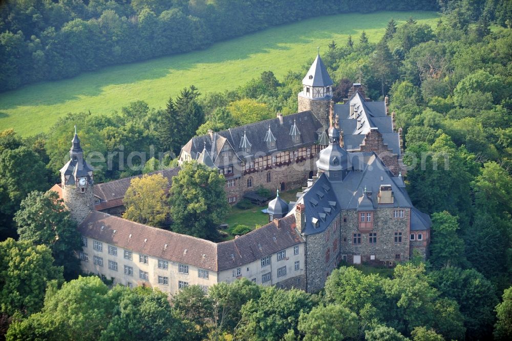 Aerial image Mansfeld - View of the castle Rammelburg in the homonymous district of the town Mansfeld in Saxony-Anhalt. It was built in the 13th Century and was used as a children's home and rehabilitation clinic at the time of the GDR. Today the building is vacant and unused