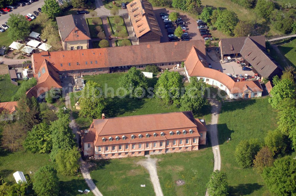 Aerial image Karlsruhe - Blick auf das Schloss Scheibenhardt bei Karlsruhe. Das Schloss Scheibenhardt ist ein ehemaliges Jagdhaus. Es wurde nach 1700 errichtet. Das Schloss wird heutzutage u. a. als Außenstelle der Staatlichen Akademie der Bildenden Künste Karlsruhe genutzt. Ein Golfclub umgibt das Gelände des Gutes. Kontakt: Stadt Karlsruhe, Medienbüro, 76133 Karlsruhe, Tel.(für Infomaterial): +49(0)721 3720 5381, E-Mail: tourismus@kmkg.de