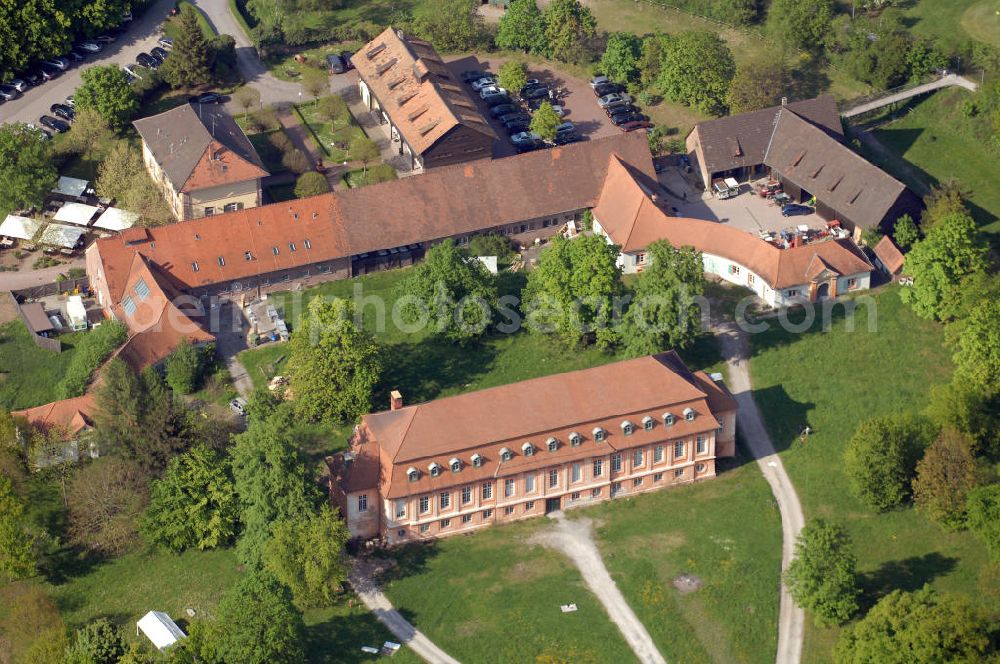 Aerial photograph Karlsruhe - Blick auf das Schloss Scheibenhardt bei Karlsruhe. Das Schloss Scheibenhardt ist ein ehemaliges Jagdhaus. Es wurde nach 1700 errichtet. Das Schloss wird heutzutage u. a. als Außenstelle der Staatlichen Akademie der Bildenden Künste Karlsruhe genutzt. Ein Golfclub umgibt das Gelände des Gutes. Kontakt: Stadt Karlsruhe, Medienbüro, 76133 Karlsruhe, Tel.(für Infomaterial): +49(0)721 3720 5381, E-Mail: tourismus@kmkg.de