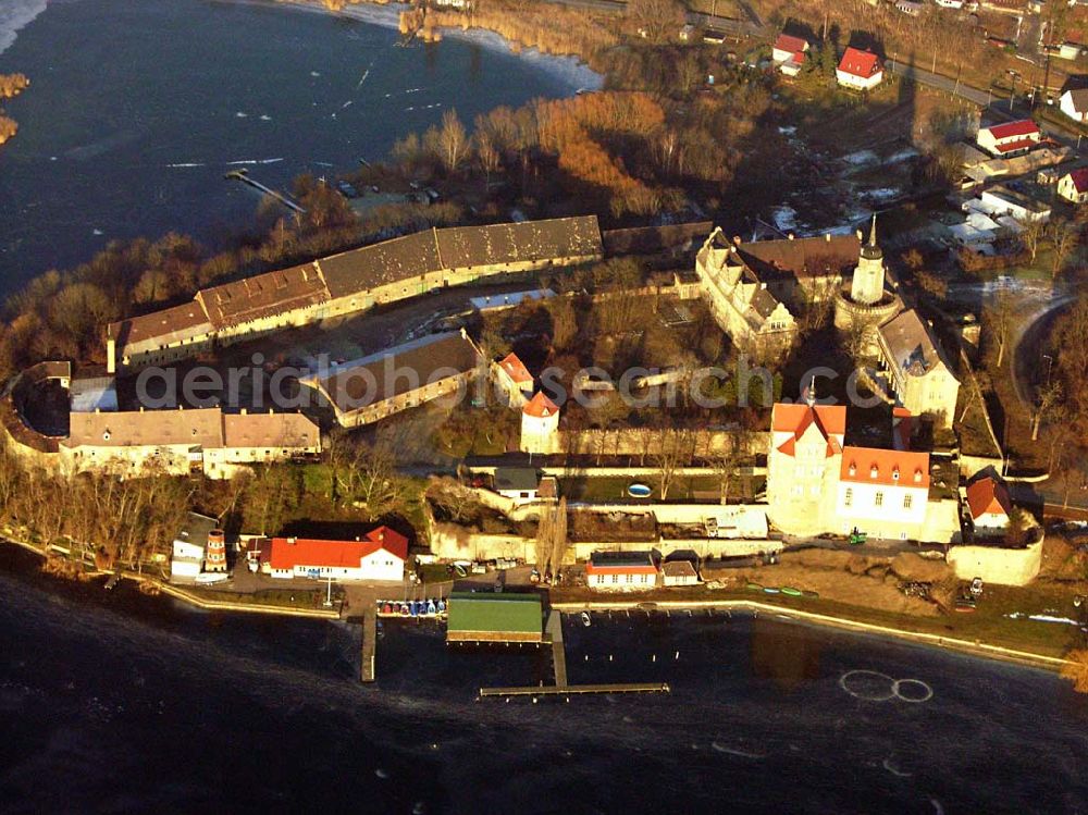 Aerial image Seeburg / Sachsen-Anhalt - 16.01.2006: Auf einer Halbinsel an der Ostseite des Süßen Sees erhebt sich Schloß Seeburg. Die Halbinsel am Süßen See ist nicht nur mit dem Schloß sondern auch durch den ehemaligen Gutshof bebaut. Geschäftsführer:Dipl.-Wi.-Ing. Claus Dieter Meinzer; Dipl.-Ing. Manfred Müller-Jehle; Anschrift:Thaddenstraße 14a; D - 69469 Weinheim;Telefon: (06201) 6 81 81; Telefax: (06201) 1 59 01; E-Mail: csg@schloss-seeburg.de