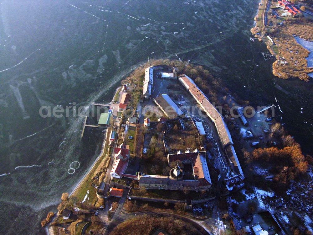 Seeburg / Sachsen-Anhalt from above - 16.01.2006: Auf einer Halbinsel an der Ostseite des Süßen Sees erhebt sich Schloß Seeburg. Die Halbinsel am Süßen See ist nicht nur mit dem Schloß sondern auch durch den ehemaligen Gutshof bebaut. Geschäftsführer:Dipl.-Wi.-Ing. Claus Dieter Meinzer; Dipl.-Ing. Manfred Müller-Jehle; Anschrift:Thaddenstraße 14a; D - 69469 Weinheim;Telefon: (06201) 6 81 81; Telefax: (06201) 1 59 01; E-Mail: csg@schloss-seeburg.de