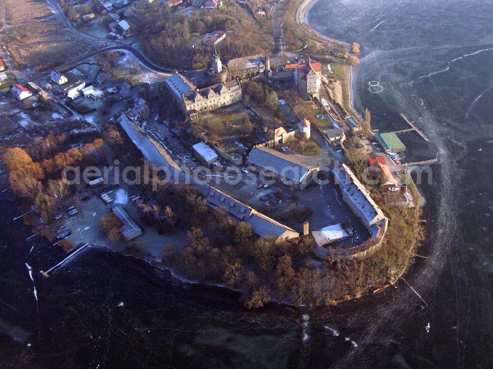 Seeburg / Sachsen-Anhalt from the bird's eye view: 16.01.2006: Auf einer Halbinsel an der Ostseite des Süßen Sees erhebt sich Schloß Seeburg. Die Halbinsel am Süßen See ist nicht nur mit dem Schloß sondern auch durch den ehemaligen Gutshof bebaut. Geschäftsführer:Dipl.-Wi.-Ing. Claus Dieter Meinzer; Dipl.-Ing. Manfred Müller-Jehle; Anschrift:Thaddenstraße 14a; D - 69469 Weinheim;Telefon: (06201) 6 81 81; Telefax: (06201) 1 59 01; E-Mail: csg@schloss-seeburg.de