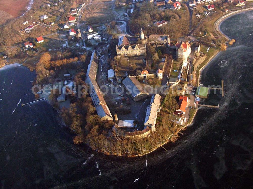 Aerial image Seeburg / Sachsen-Anhalt - 16.01.2006: Auf einer Halbinsel an der Ostseite des Süßen Sees erhebt sich Schloß Seeburg. Die Halbinsel am Süßen See ist nicht nur mit dem Schloß sondern auch durch den ehemaligen Gutshof bebaut. Geschäftsführer:Dipl.-Wi.-Ing. Claus Dieter Meinzer; Dipl.-Ing. Manfred Müller-Jehle; Anschrift:Thaddenstraße 14a; D - 69469 Weinheim;Telefon: (06201) 6 81 81; Telefax: (06201) 1 59 01; E-Mail: csg@schloss-seeburg.de