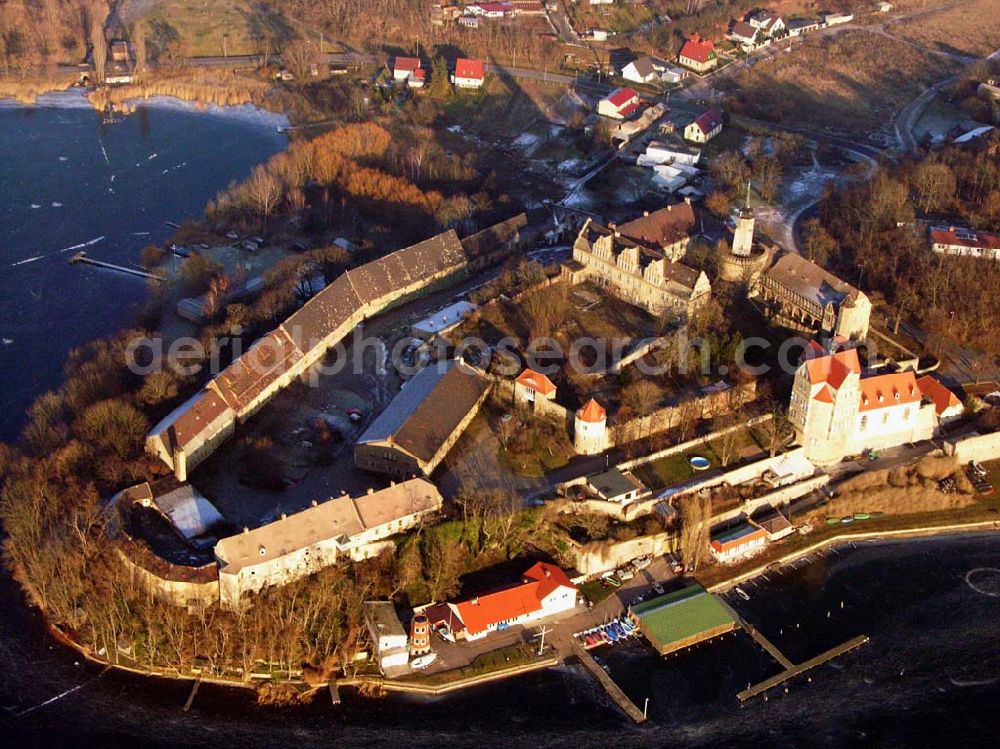 Aerial photograph Seeburg / Sachsen-Anhalt - 16.01.2006: Auf einer Halbinsel an der Ostseite des Süßen Sees erhebt sich Schloß Seeburg. Die Halbinsel am Süßen See ist nicht nur mit dem Schloß sondern auch durch den ehemaligen Gutshof bebaut. Geschäftsführer:Dipl.-Wi.-Ing. Claus Dieter Meinzer; Dipl.-Ing. Manfred Müller-Jehle; Anschrift:Thaddenstraße 14a; D - 69469 Weinheim;Telefon: (06201) 6 81 81; Telefax: (06201) 1 59 01; E-Mail: csg@schloss-seeburg.de