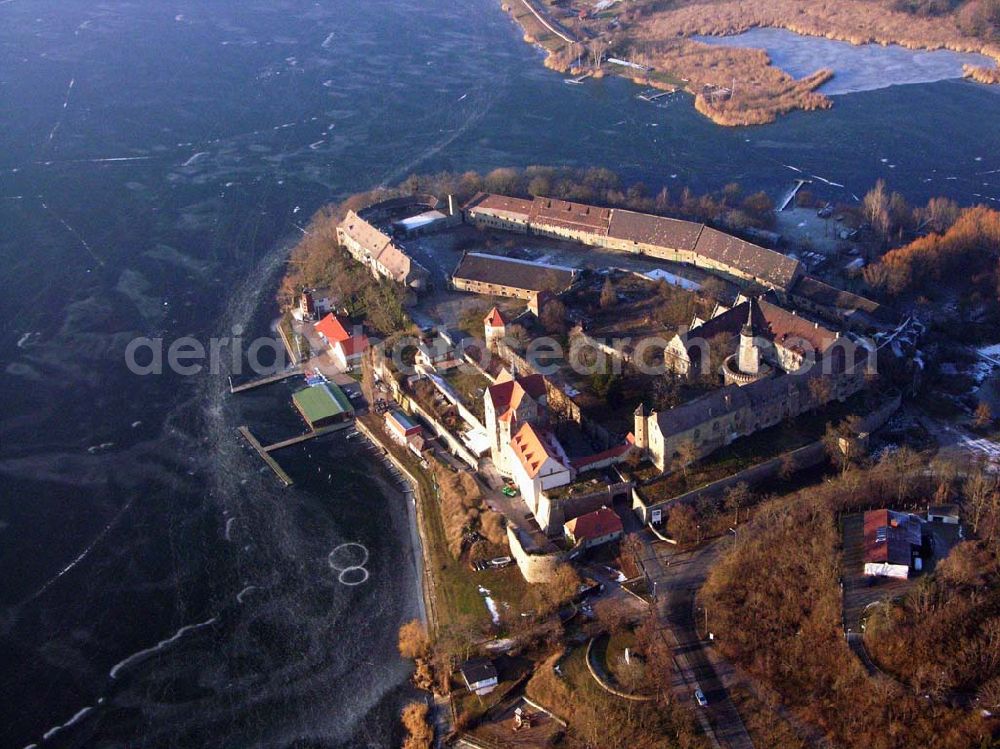 Aerial image Seeburg / Sachsen-Anhalt - 16.01.2006: Auf einer Halbinsel an der Ostseite des Süßen Sees erhebt sich Schloß Seeburg. Die Halbinsel am Süßen See ist nicht nur mit dem Schloß sondern auch durch den ehemaligen Gutshof bebaut. Geschäftsführer:Dipl.-Wi.-Ing. Claus Dieter Meinzer; Dipl.-Ing. Manfred Müller-Jehle; Anschrift:Thaddenstraße 14a; D - 69469 Weinheim;Telefon: (06201) 6 81 81; Telefax: (06201) 1 59 01; E-Mail: csg@schloss-seeburg.de