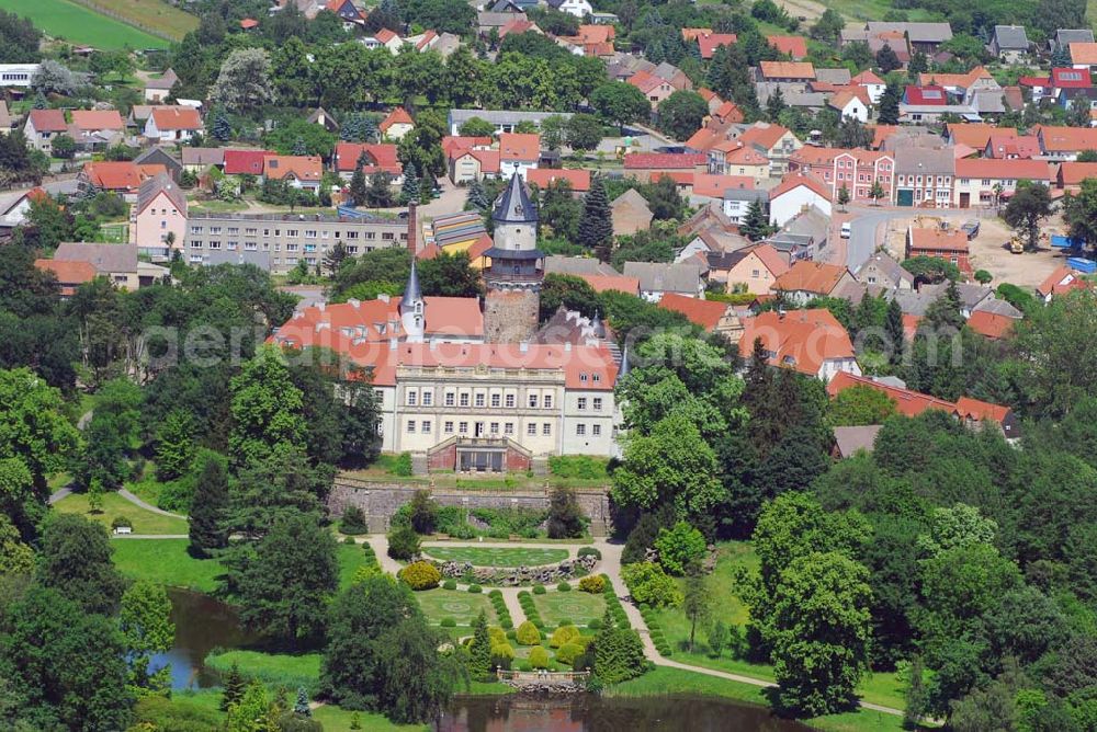 Aerial photograph Wiesenburg - Blick auf das Schloss Wiesenburg in Wiesenbug/Brandenburg.Das Schloss wurde urkundlich zum ersten Mal im Jahre 1161 erwähnt. Im Inneren des Schlosses sind moderne Wohnungen sowie Büroräume entstanden. Kontakt: Schloss Wiesenburg GbR, Schloss, 14827 Wiesenburg, Telefon (03 38 49) 5 58 90, Fax (03 38 49) 5 58 99