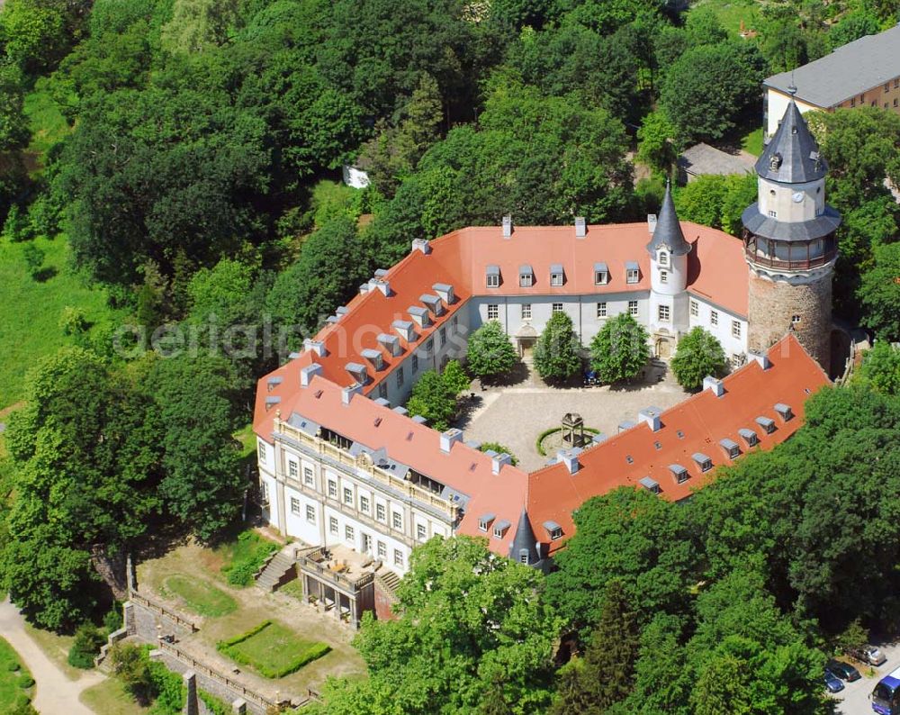 Aerial photograph Wiesenburg - Blick auf das Schloss Wiesenburg in Wiesenbug/Brandenburg.Das Schloss wurde urkundlich zum ersten Mal im Jahre 1161 erwähnt. Im Inneren des Schlosses sind moderne Wohnungen sowie Büroräume entstanden. Kontakt: Schloss Wiesenburg GbR, Schloss, 14827 Wiesenburg, Telefon (03 38 49) 5 58 90, Fax (03 38 49) 5 58 99