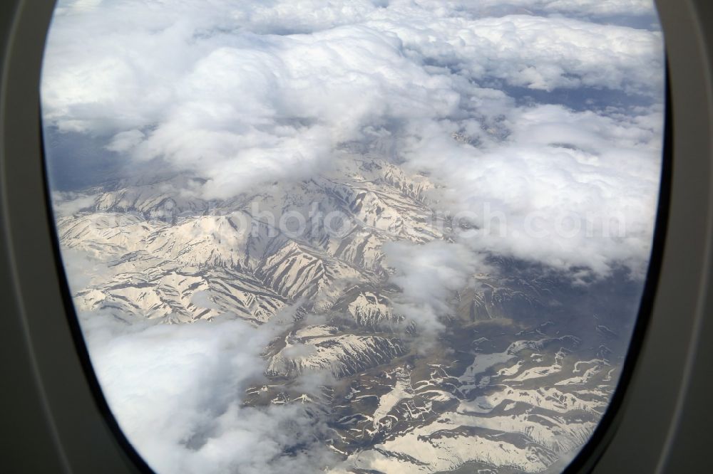 Piranschahr from above - Snowy desert landscape in the mountains of West Azerbaijan Province, Iran