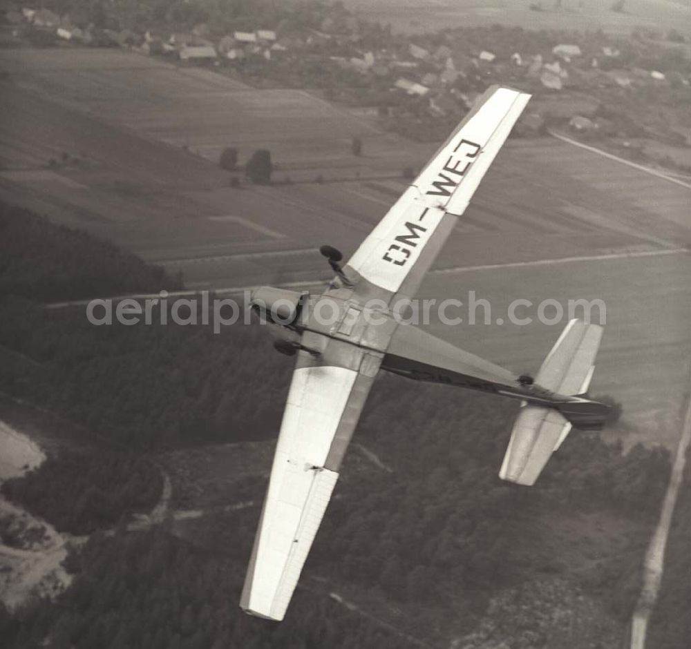 Neuhausen from the bird's eye view: Neuhausen 1969 Blick auf ein Schulflugzeug Z226 über dem Flugplatz Neuhausen