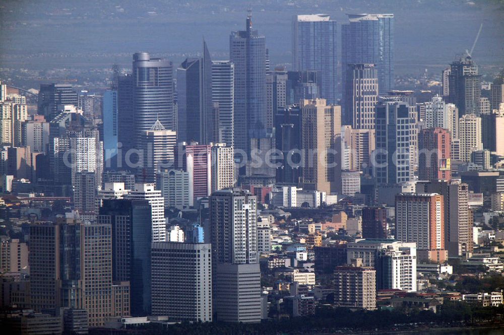 Aerial photograph Manila - Blick auf die Skyline von Manila. Die Hauptstadt der Philippinen, in der 1,7 Mio. Menschen leben, ist das politische, wirtschaftliche und kulturelle Zentrum des Landes. View of the skyline of Manila. The capital of the Philippines, where 1.7 million people live, is the political, economic and cultural center of the country.