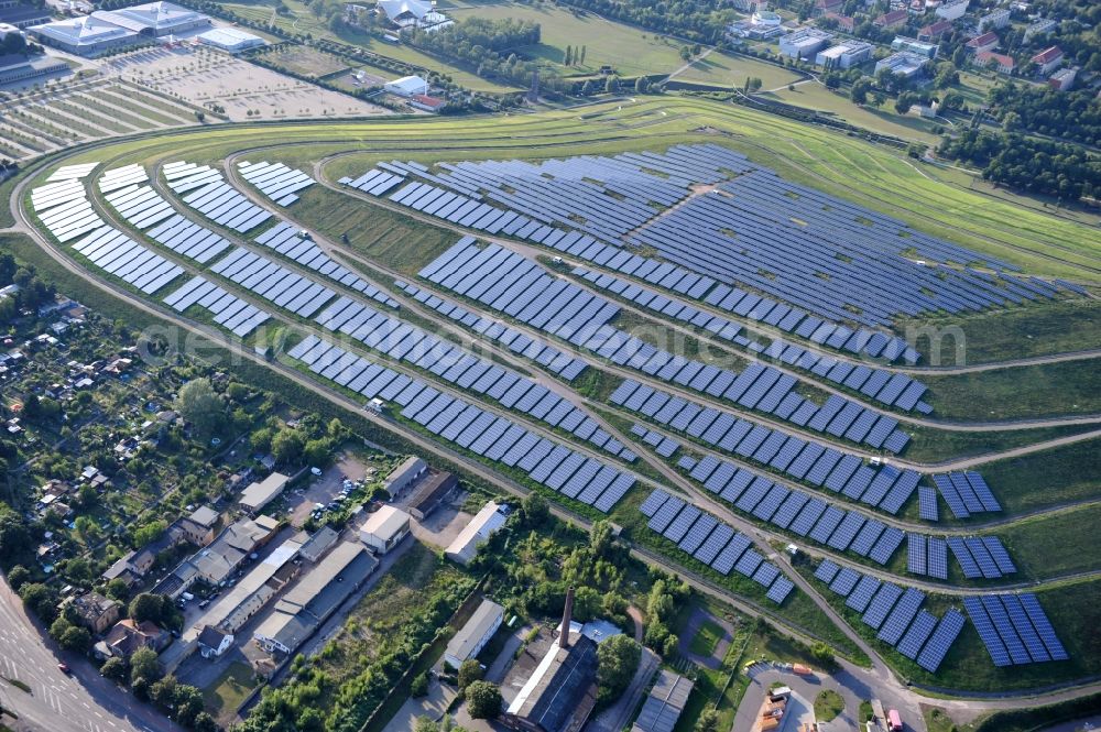 Magdeburg from the bird's eye view: View of the solar park in Magdeburg in Saxony-Anhalt. Under the direction of the WSB group, there was built the solar park within 5 months on the former domestic waste landfill Cracauer Anger, which was closed in 1998. The plant went into operation in December 2011