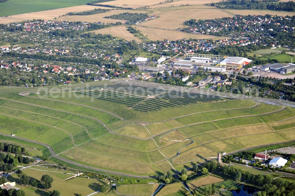 Aerial photograph Magdeburg - View of the solar park in Magdeburg in Saxony-Anhalt. Under the direction of the WSB group, there was built the solar park within 5 months on the former domestic waste landfill Cracauer Anger, which was closed in 1998. The plant went into operation in December 2011