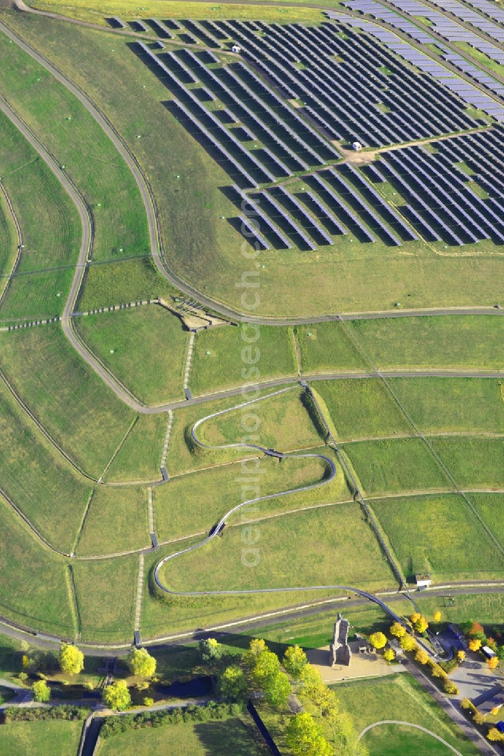 Magdeburg from above - View of the solar park in Magdeburg in Saxony-Anhalt. Under the direction of the WSB group, there was built the solar park within 5 months on the former domestic waste landfill Cracauer Anger, which was closed in 1998. The plant went into operation in December 2011