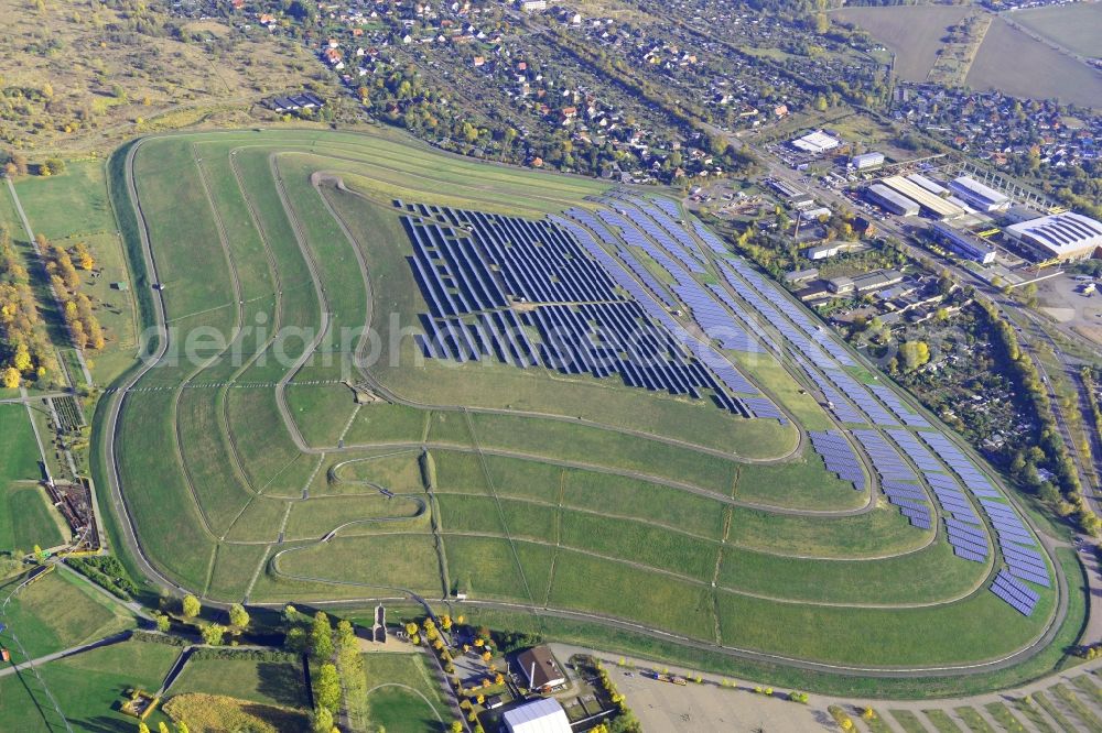 Magdeburg from the bird's eye view: View of the solar park in Magdeburg in Saxony-Anhalt. Under the direction of the WSB group, there was built the solar park within 5 months on the former domestic waste landfill Cracauer Anger, which was closed in 1998. The plant went into operation in December 2011