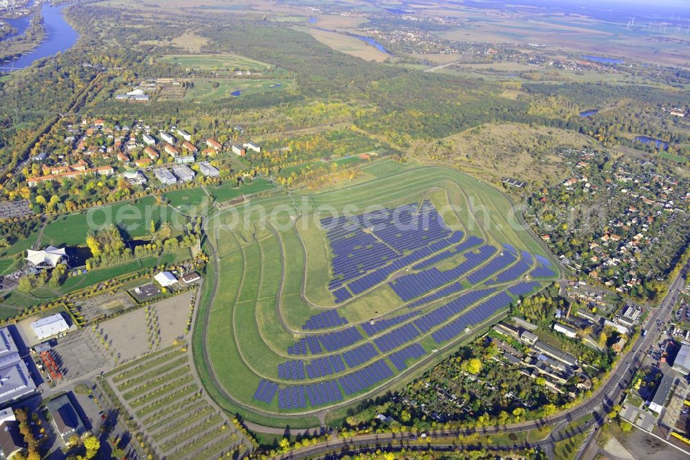 Magdeburg from the bird's eye view: View of the solar park in Magdeburg in Saxony-Anhalt. Under the direction of the WSB group, there was built the solar park within 5 months on the former domestic waste landfill Cracauer Anger, which was closed in 1998. The plant went into operation in December 2011