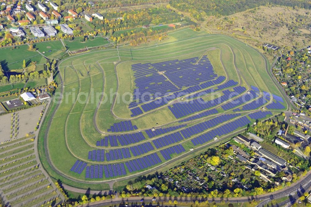 Aerial photograph Magdeburg - View of the solar park in Magdeburg in Saxony-Anhalt. Under the direction of the WSB group, there was built the solar park within 5 months on the former domestic waste landfill Cracauer Anger, which was closed in 1998. The plant went into operation in December 2011