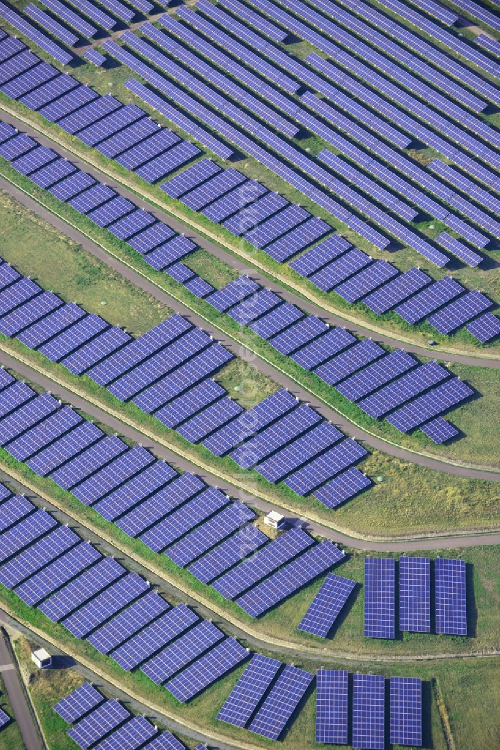 Magdeburg from above - View of the solar park in Magdeburg in Saxony-Anhalt. Under the direction of the WSB group, there was built the solar park within 5 months on the former domestic waste landfill Cracauer Anger, which was closed in 1998. The plant went into operation in December 2011