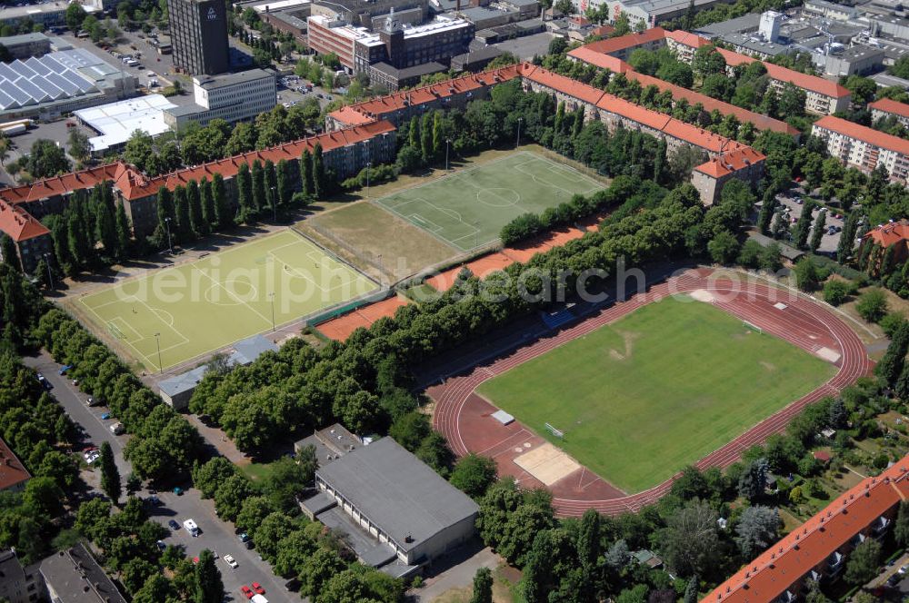 Berlin from the bird's eye view: Blick auf die Sportanlage Friedrich Ebert. Die Anlage wurde 1936 eröffnet und verfügt über 3 Großspielfelder, davon 1 Rasenfläche und 2 Kunstrasenplätze. Außerdem können 1 Kunststofflaufbahn von 400m Länge, 3 Tennissandplätze und 1 Sporthalle genutzt werden. Das Stadion hat eine Kapazität für 12.000 Zuschauer. Hier sind BFC Viktoria 89 und SD Croatia Berlin zuhause. Adresse: Bosestr. 21, 12103 Berlin, Tel. +49 (0)30 7560 2696