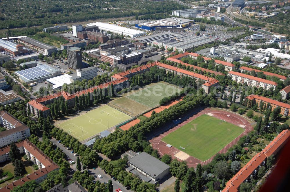 Aerial image Berlin - Blick auf die Sportanlage Friedrich Ebert. Die Anlage wurde 1936 eröffnet und verfügt über 3 Großspielfelder, davon 1 Rasenfläche und 2 Kunstrasenplätze. Außerdem können 1 Kunststofflaufbahn von 400m Länge, 3 Tennissandplätze und 1 Sporthalle genutzt werden. Das Stadion hat eine Kapazität für 12.000 Zuschauer. Hier sind BFC Viktoria 89 und SD Croatia Berlin zuhause. Adresse: Bosestr. 21, 12103 Berlin, Tel. +49 (0)30 7560 2696