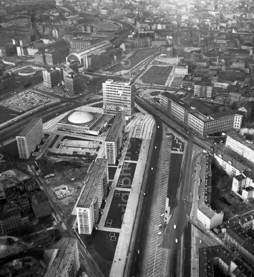 Aerial photograph Berlin - View into town along the Karl-Marx-Allee towards Alexanderplatz station in Berlin. In the foreground is the house of the teacher and the Congress Hall