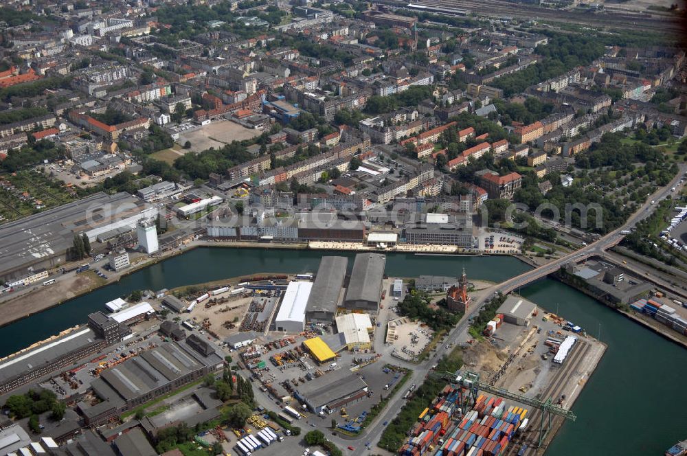 Aerial image Dortmund - Blick auf den Stadthafen und das Alte Hafenamt in Dortmund. Heute finden sich im denkmalgeschützten Gebäude Räumlichkeiten der Wasserschutzpolizei, ein Treffpunkt der Marinekameradschaft Dortmund und das mit der ursprünglichen Ausstattung erhaltene Kaiserzimmer. Die Dortmunder Hafen AG nutzt das Gebäude zudem als Ausstellungsort für die Ausstellung Schifffahrt und Hafen. Kontakt: Dortmunder Hafen AG, Speicherstrasse 23, 44147 Dortmund, Tel. +49 (0)231 98 39 6 81, Fax +49 (0)231 98 39 6 99