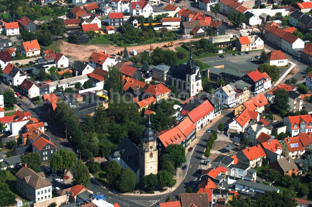 Aerial photograph Friedrichroda - Blick auf den Stadtkern von Friedirchroda im Landkreis Gotha in Thüringen. Gelegen im Nordwesten des Thüringer Walds, befindet sich die Stadt in der Nähe der beiden größeren Städte Eisenach und Gotha. Friedrichroda entstand mit dem Bau der Schauenburg durch Ludwig mit dem Barte um 1044. Seit 1597 besitzt Friedrichroda Stadtrecht. Heute gilt die Stadt als Luftkurort und verfügt über ein Parkbad und Therapiezentrum im RAMADA Hotel, bietet Trinkkuren mit natürlichem Heilwasser, verfügt über Kneipp Anlagen, ein Dialysezentrum sowie diverse physiotherapeutische Praxen. Kontakt: Kur- und Tourismusamt Friedrichroda, Marktstraße 13 / 15 99894 Friedrichroda, Tel. +49(0)3623 33 200, Fax +49(0)3623 33 2029, Email: friedrichroda.kur@t-online.de