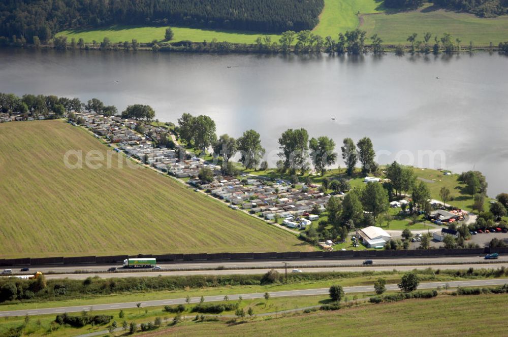 Oelsnitz from above - Blick auf die Talsperre Pirk mit einem Campingplatz und der A 72. Die Talsperre wurde von 1935 - 1938 erbaut und staut das Wasser der Weißen Elster, der Stausee ist das größte Naherholungsgebiet von Oelsnitz. Kontakt: Naherholung Talsperre Pirk GmbH, Am Strand 4, 08606 Oelsnitz/OT Taltitz, Tel. 037421 23547, Fax 037421 259863, E-Mail info@naherholung-talsperre-pirk.de,